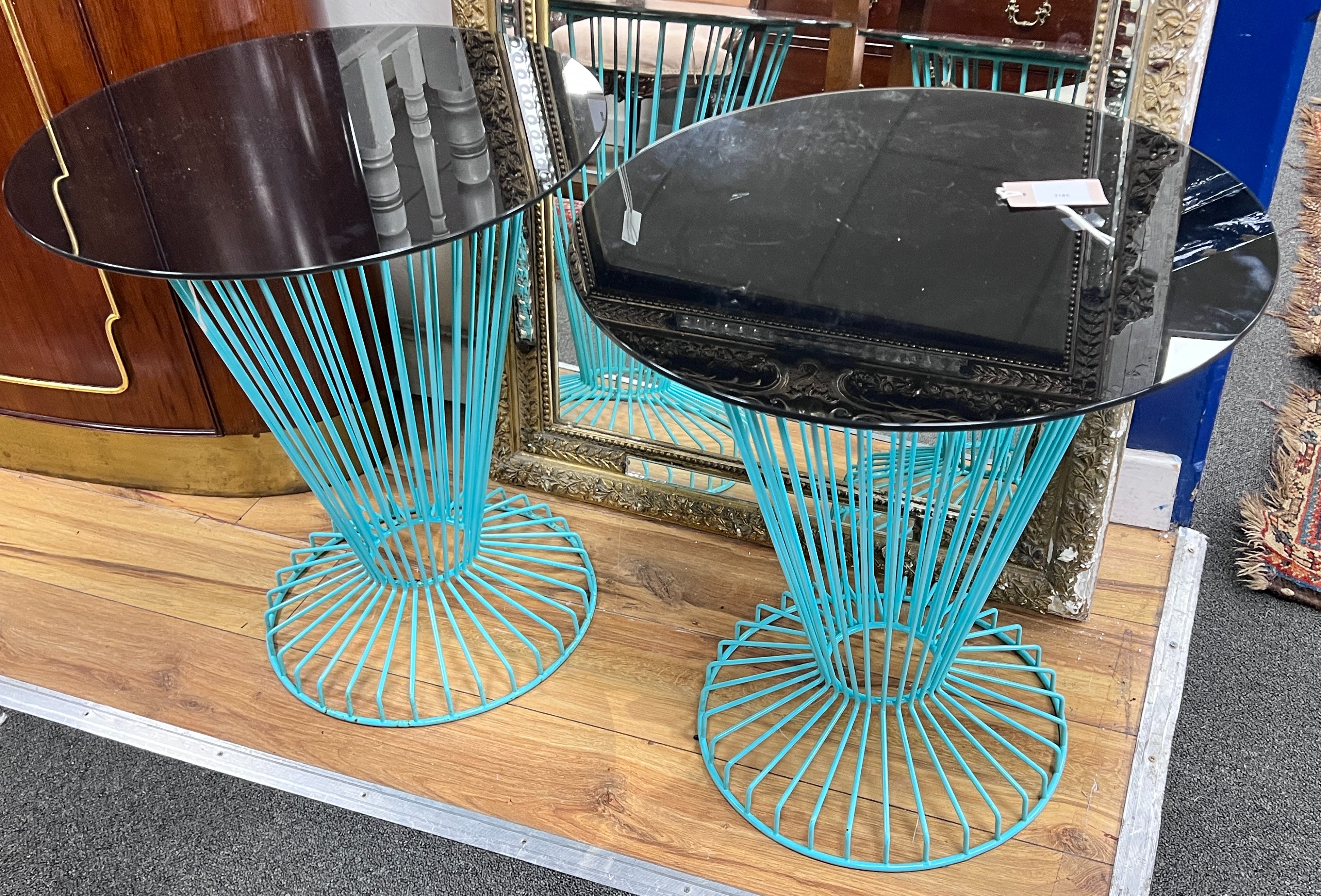 A pair of mid century style circular glass topped painted wrought iron occasional tables, diameter 50cm, height 56cm